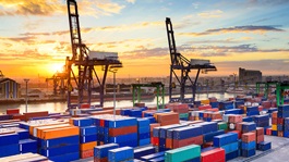 Image of shipping area with containers and crane