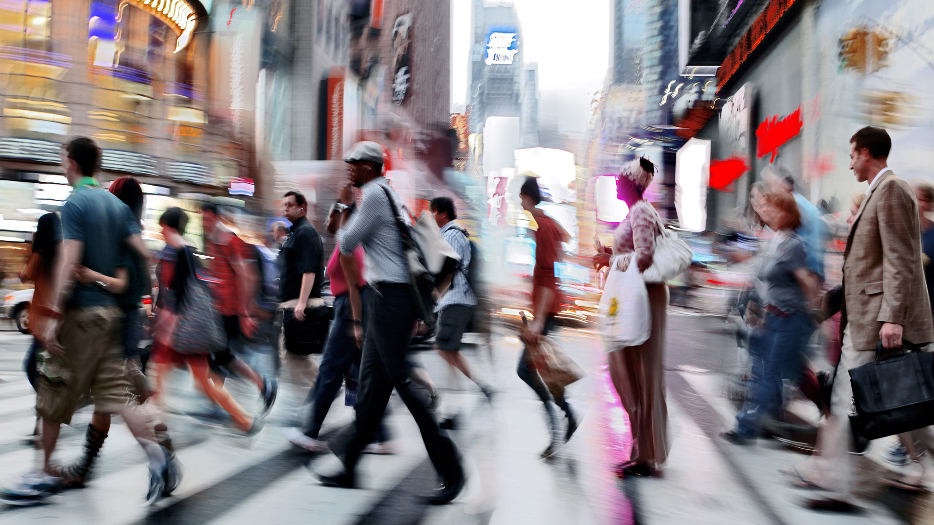 Crowd crossing street