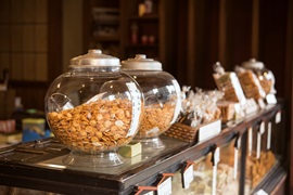 Old shop counter in Tokyo with jars of rice crackers