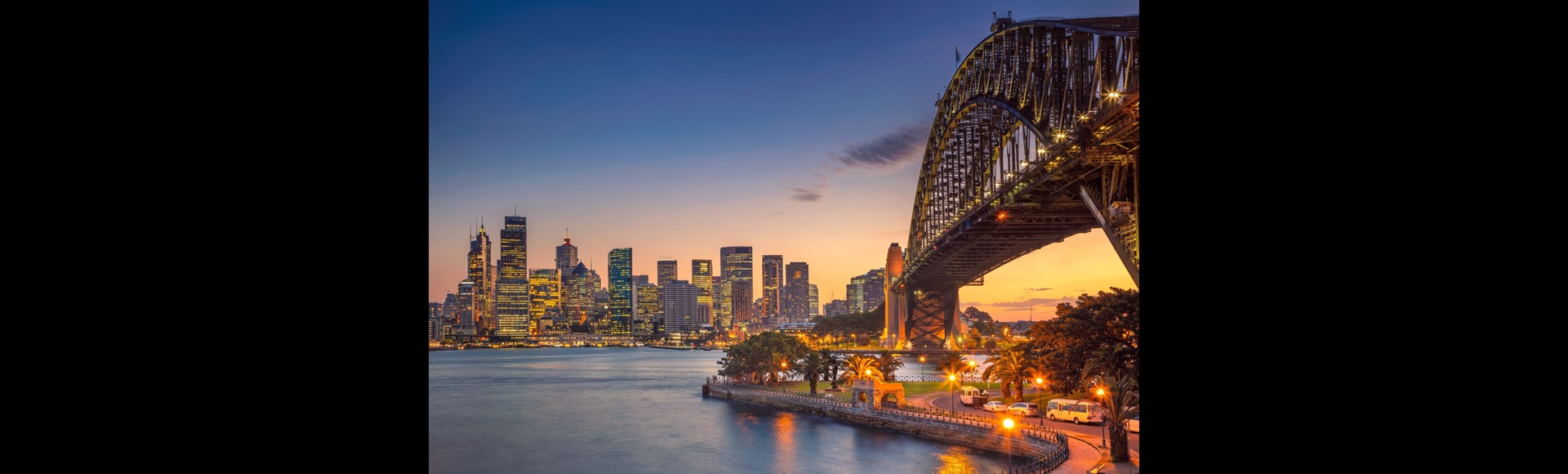 Sydney harbour bridge under sunset sky