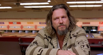 A still from the film The Big Lebowski showing Jeff Bridges in a cardigan