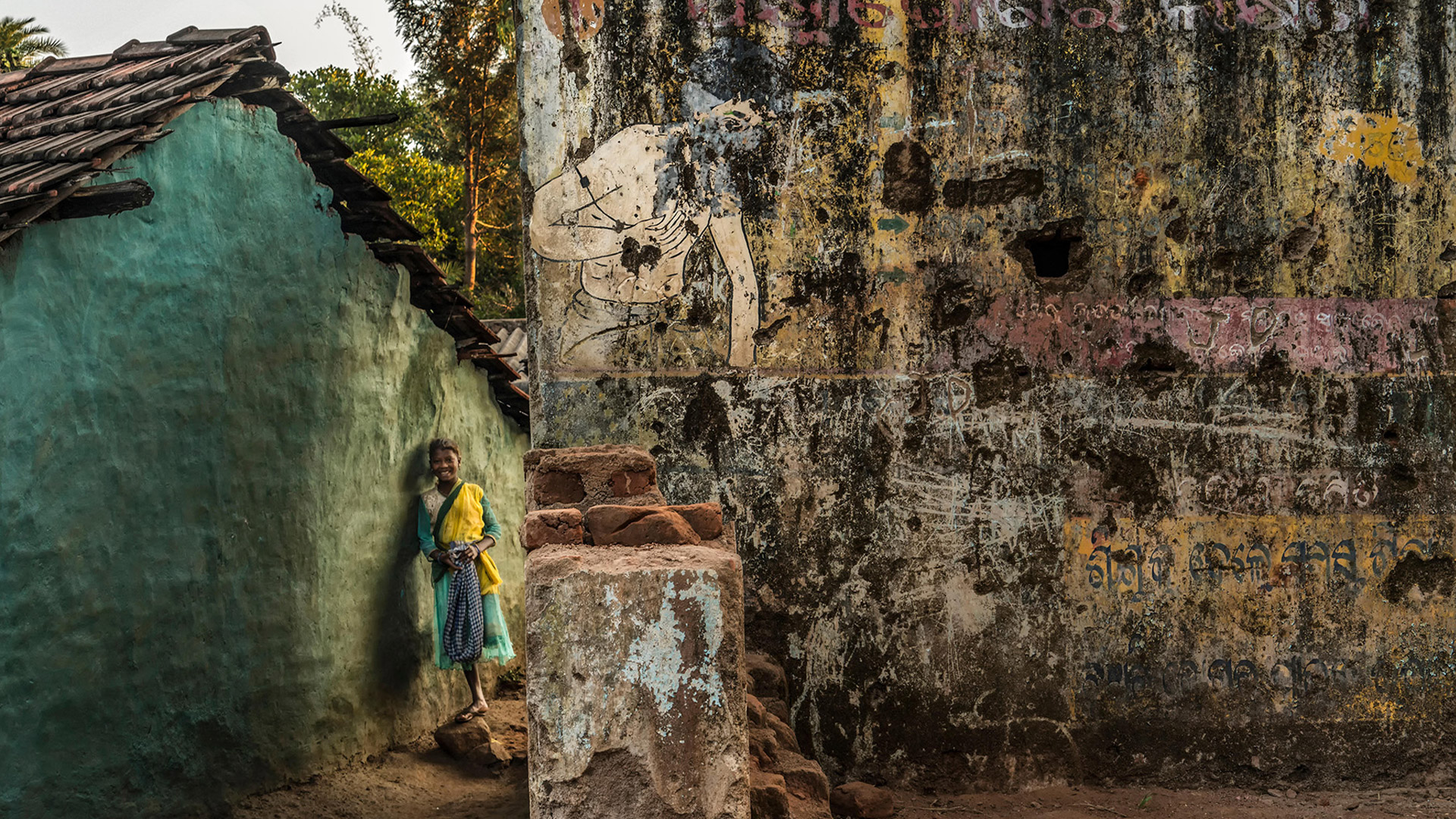 painting of girl against wall