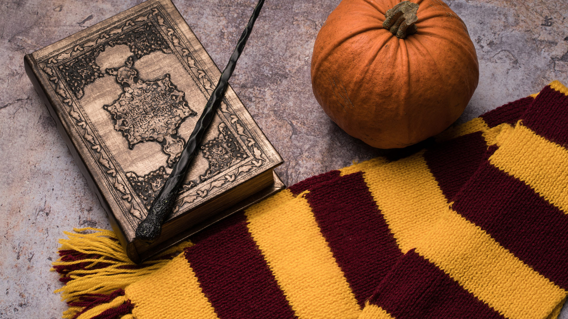 Scarf, wand, spellbook