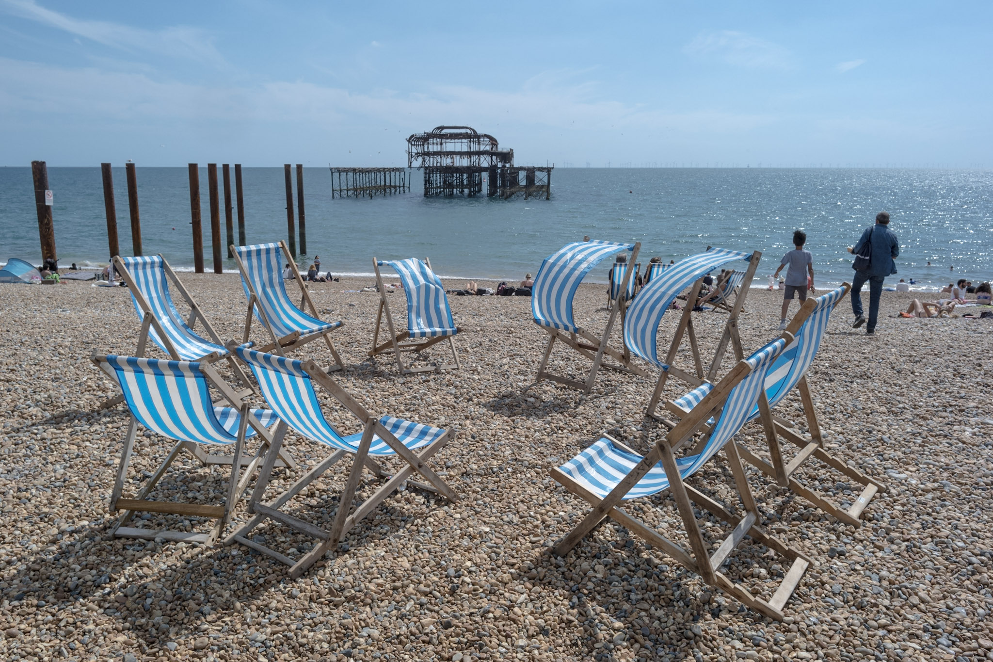 Deckchairs on Brighton beach by Mark Heathcote
