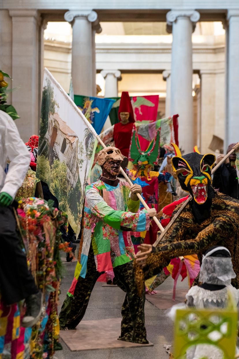 Joe Humphreys pic of Hew Locke's Procession at Tate Britain, full of colour, height, costume and exuberance