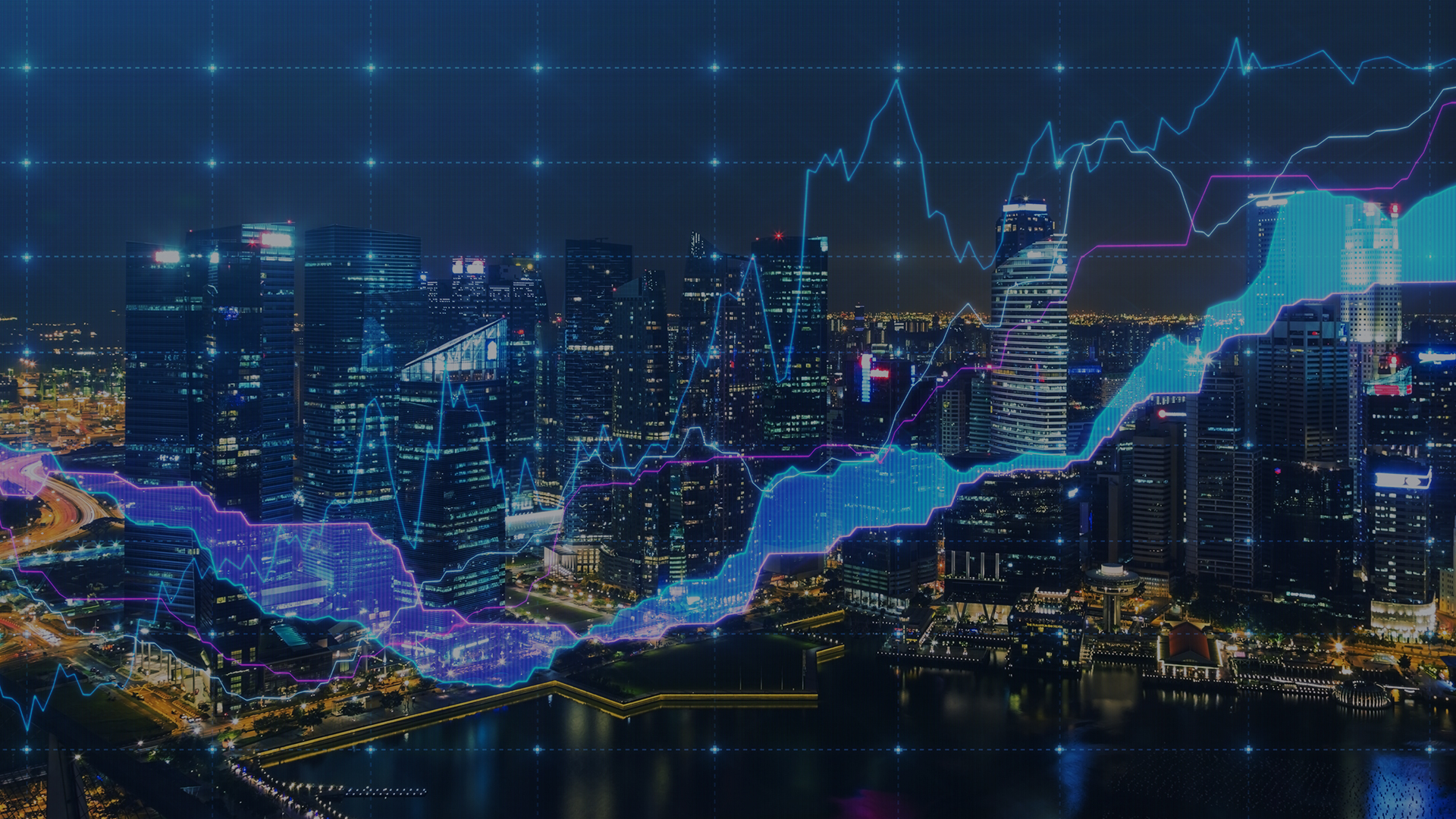 Night view of office buildings with a financial graph overlay