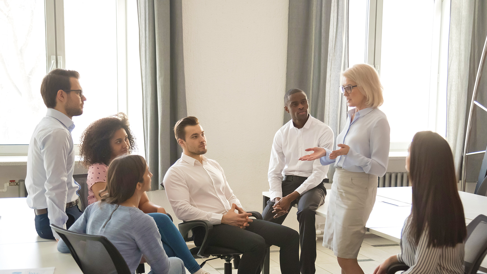 Students in boardroom with Lawyer