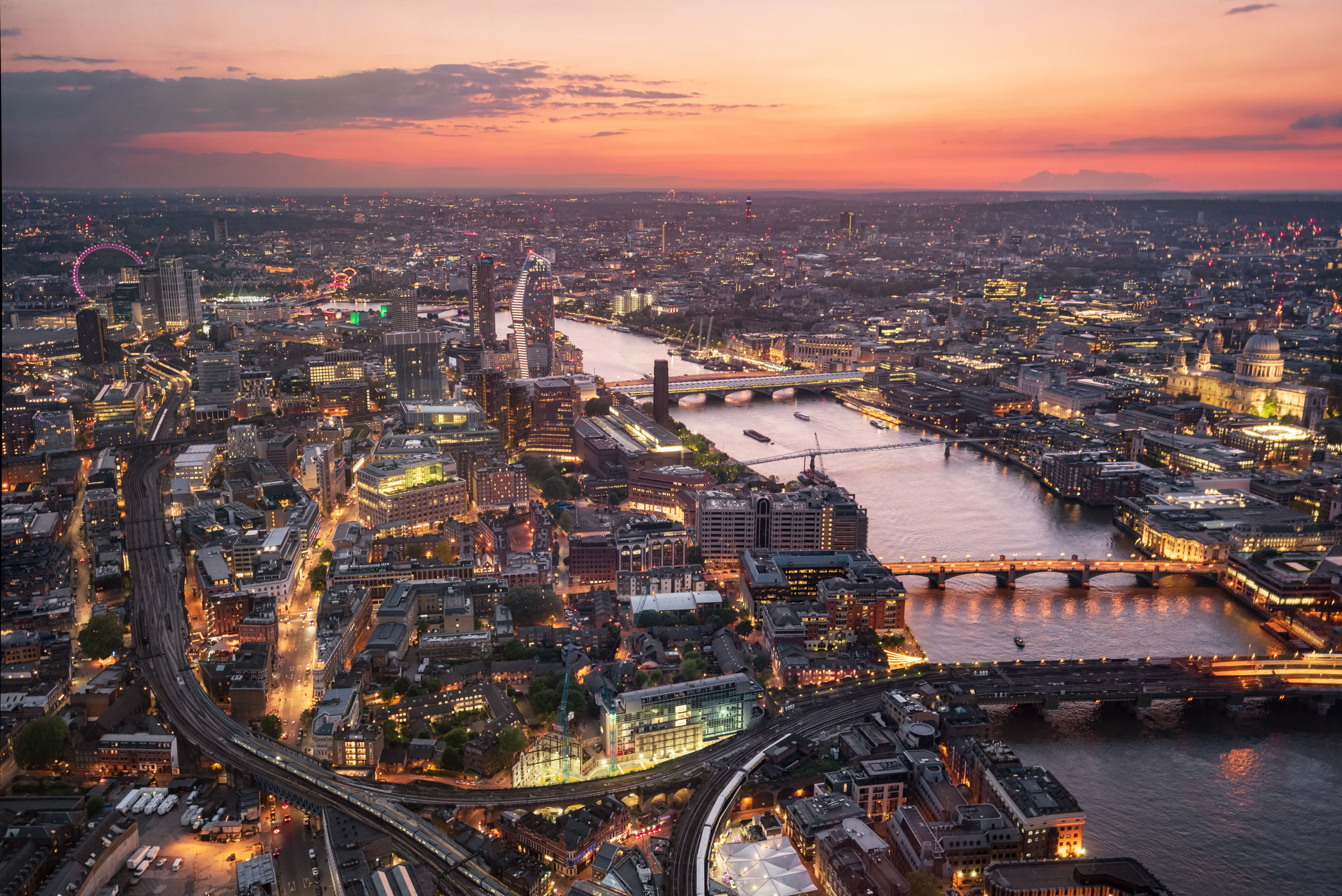 Aerial view of London skyline at sunset