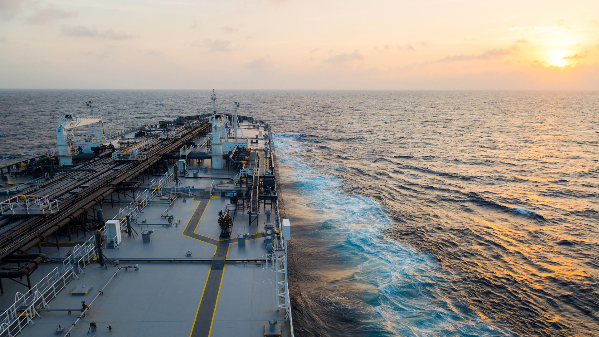 Big grey oil tanker underway in the open sea