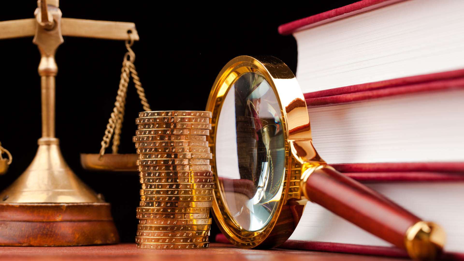 Magnifying glass, equal-arm balance, money, textbooks
