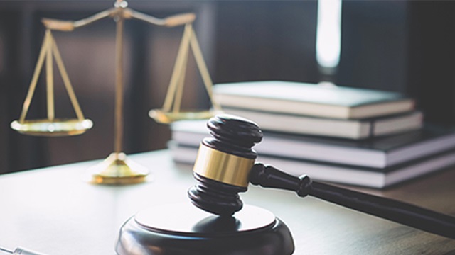 Court image with judges gavel and scales