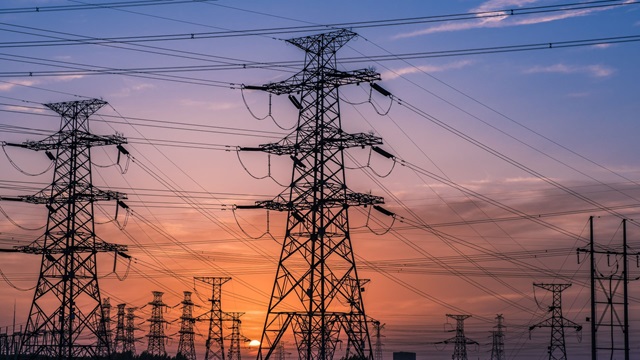 Rows of power lines at dusk
