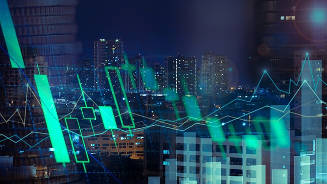 Financial graph and chart digitally displayed with a city skyline background