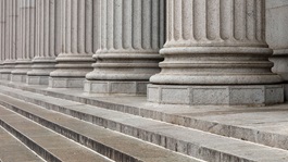 Financial-institution-column-court-judge-AdobeStock_273138760