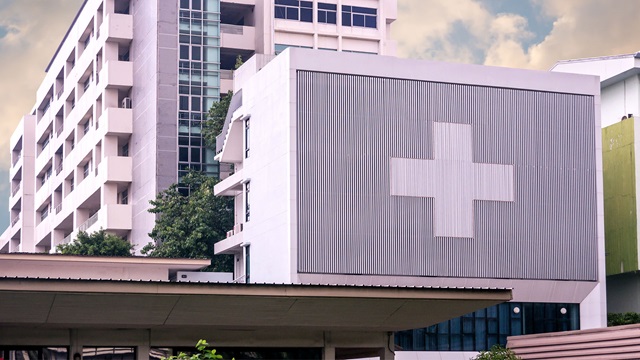 Hospital/medical building with clouds in the sky