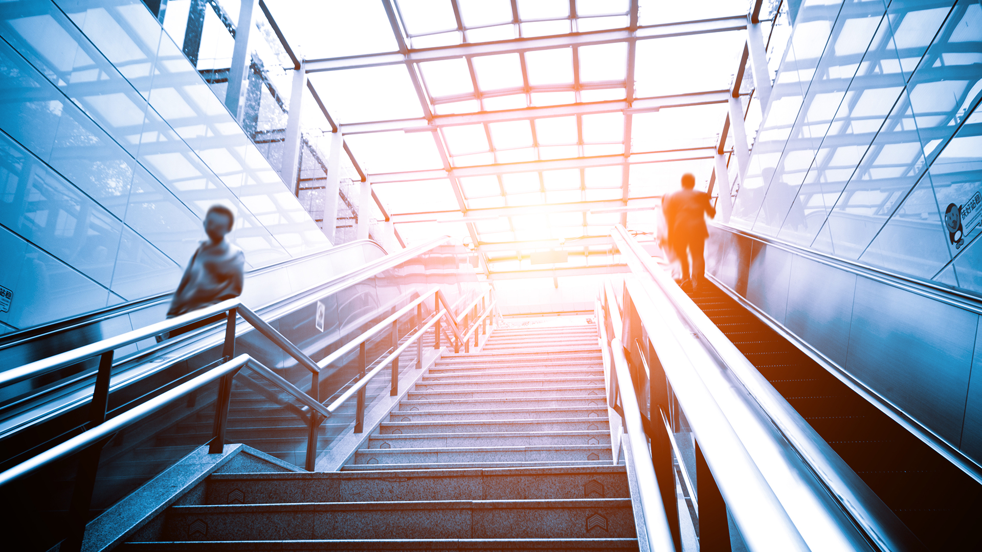 People walking on escalators