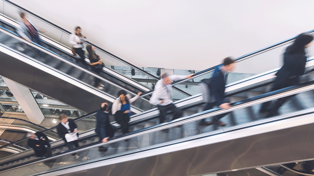 people on the escalator
