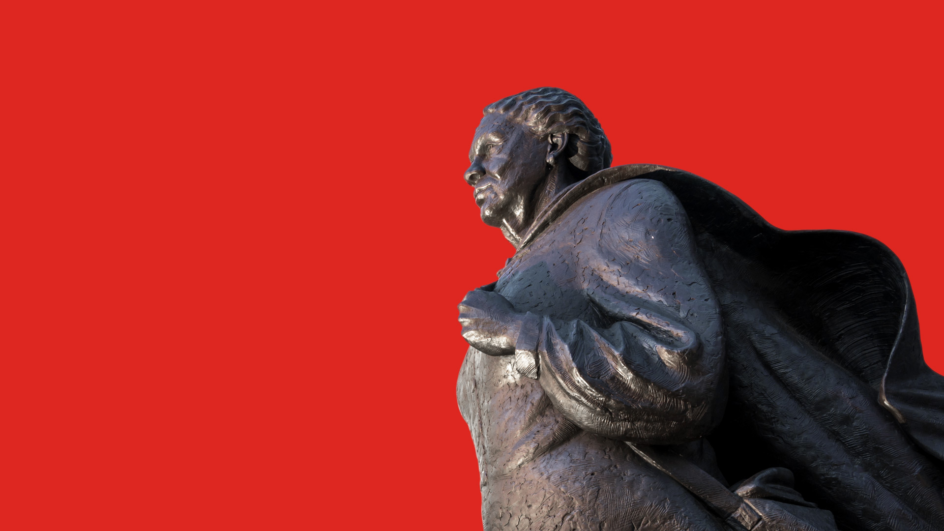 Statue on red background