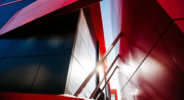 Red building with sunlight coming through