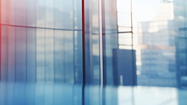 Blurred glass wall of modern business office building at the business center