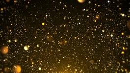A cluster of golden sparkles with a dark background
