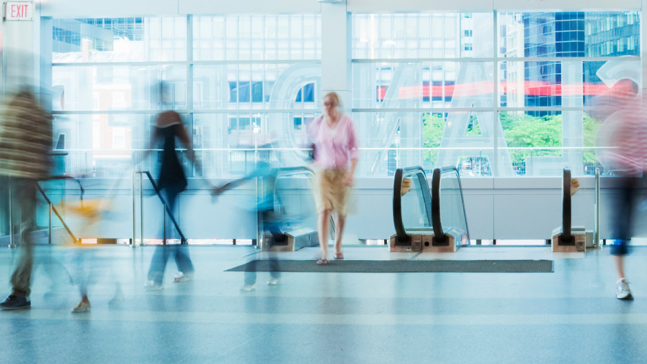 People walking an escalator