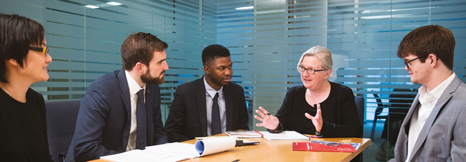 people sitting in meeting