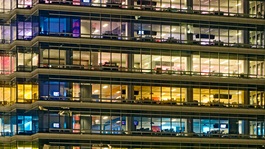 Image of colorful office building at night