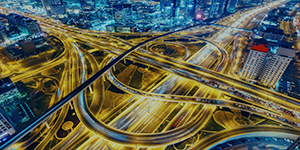 Highway intersections with car headlights