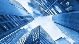 Blue building, sunny skies