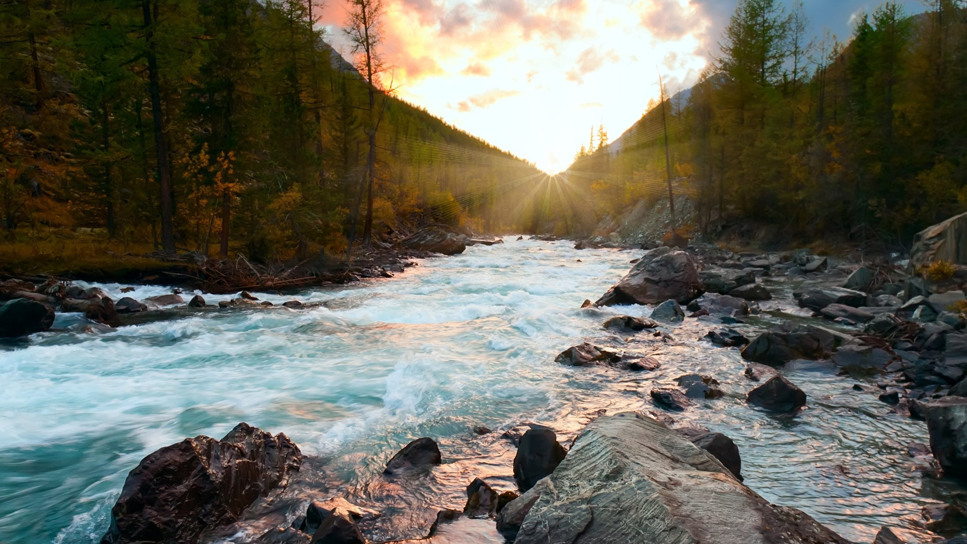 River in northern Canada flowing with sunset