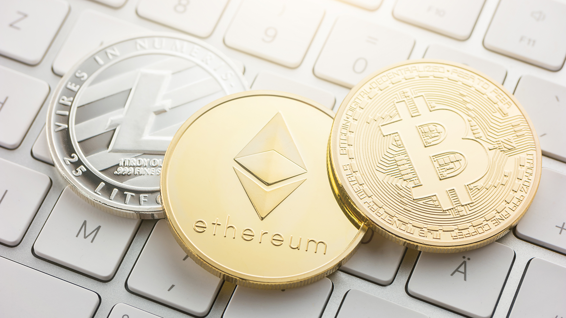 Cryptocurrency coins on keyboard