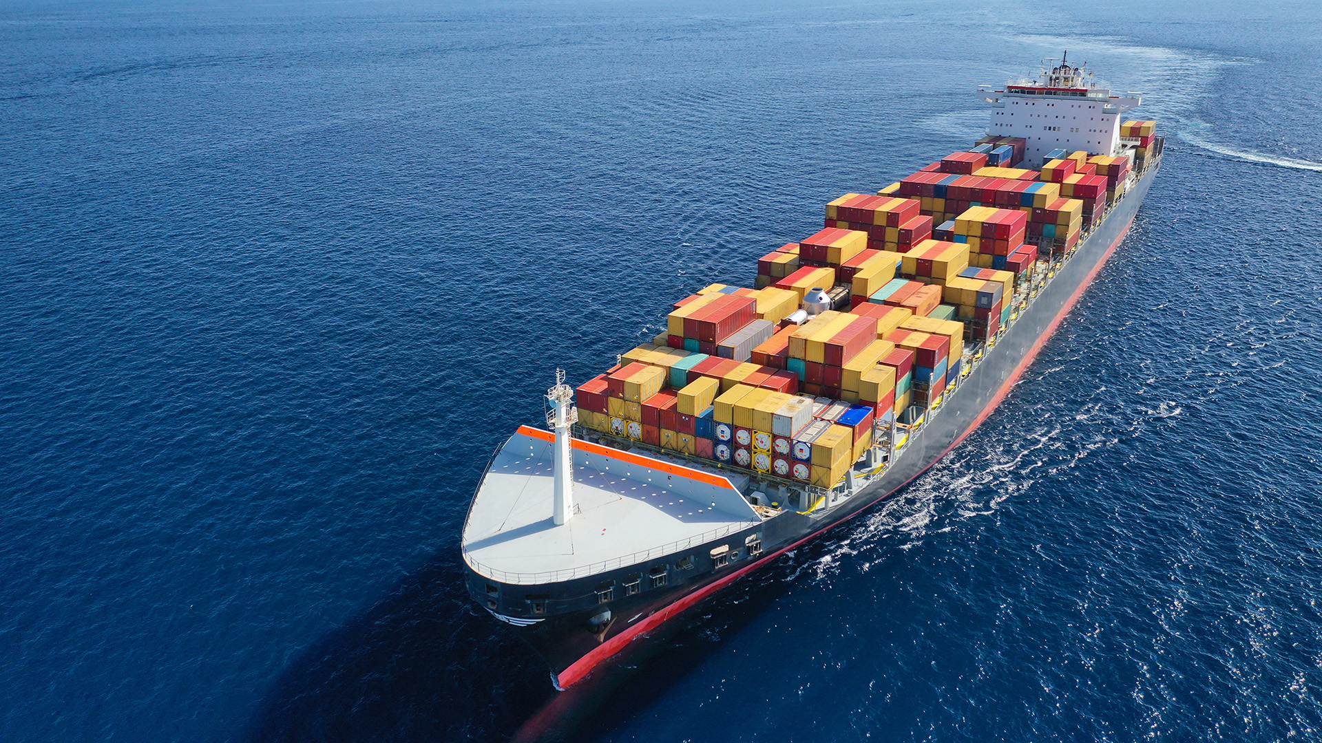 ship carrying containers in the sea