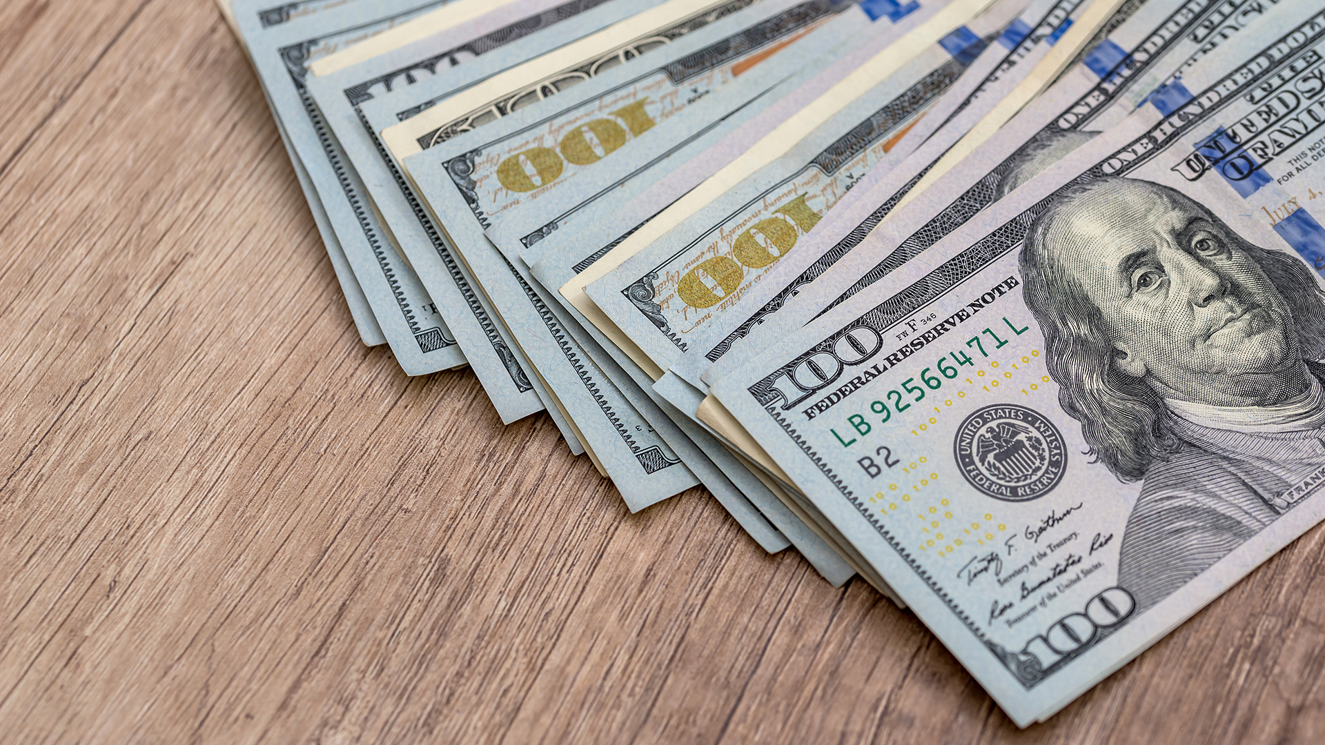 Stack of US $100 bills