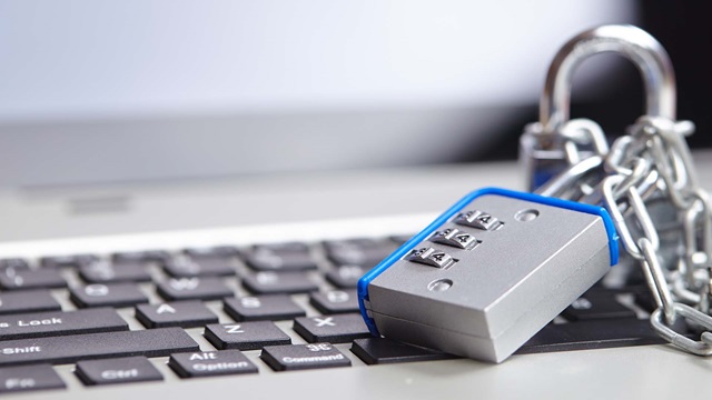 Lock and chain on a laptop keyboard