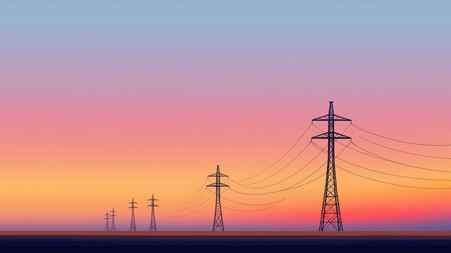 Powerlines in the distance with the sky as a sunset