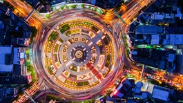 Aerial-top-view-road-roundabout-with-car-lots