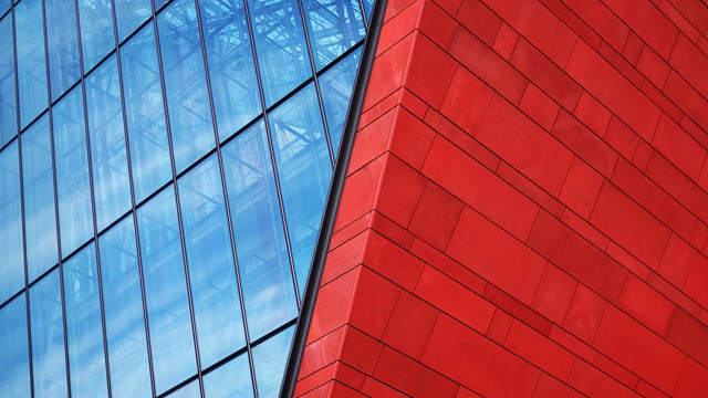 Financial-Restructuring-modern-glass-and-red-brick-building-with-blue-sky-background-metal-structure-glass-business-center