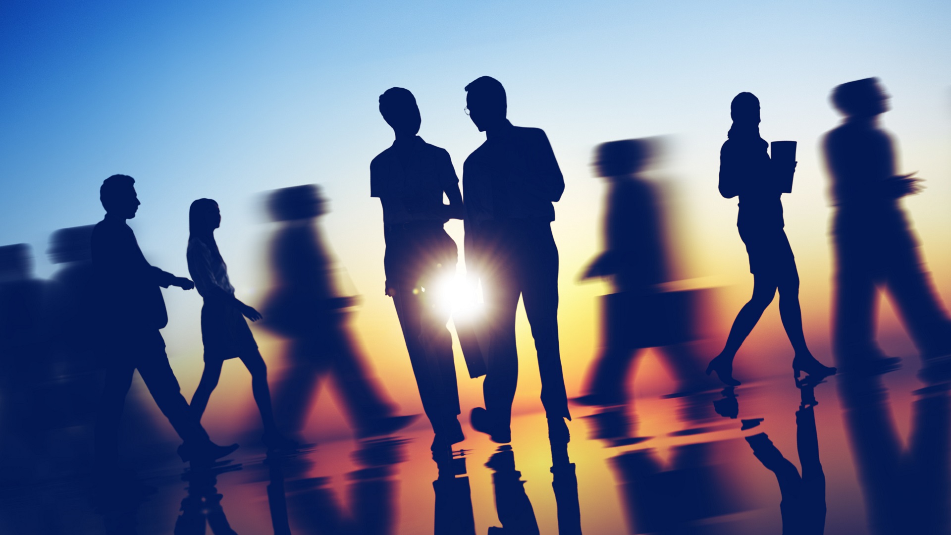 Shadows of people at sunset