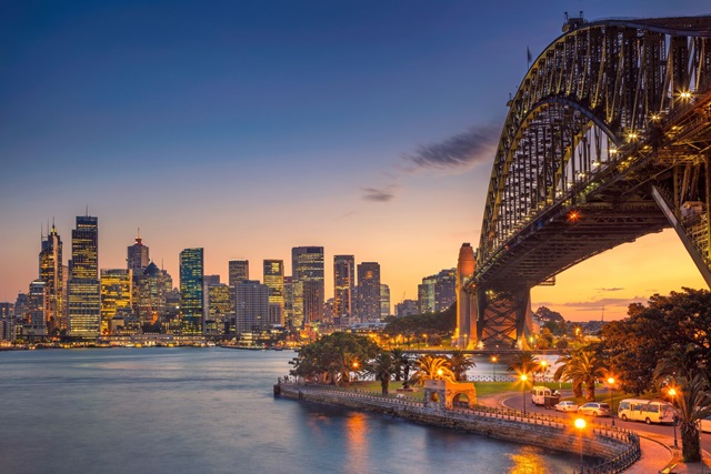 Sydney harbour bridge under sunset sky