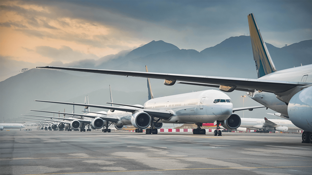 airport runway with planes