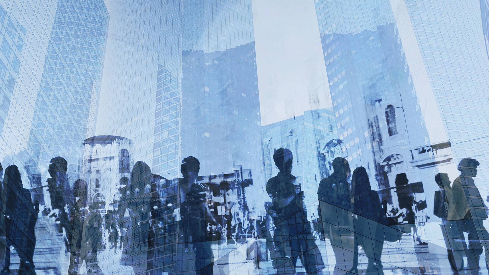 dark shadows people in front of blue buildings