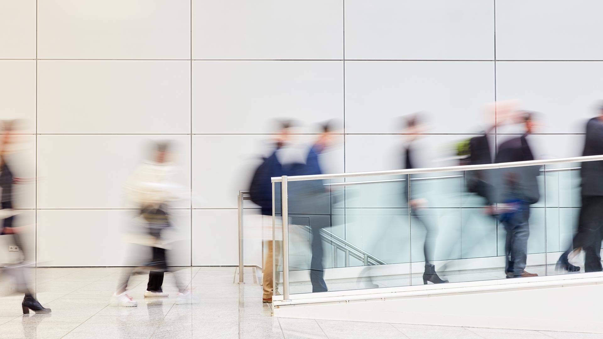 employees in a line going up walkway