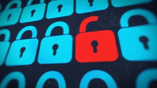 Écran d'ordinateur affichant une rangée d'icônes de cadenas bleus verrouillés, celui du milieu étant rouge et déverrouillé