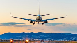 Rear view of an airplane ready to land