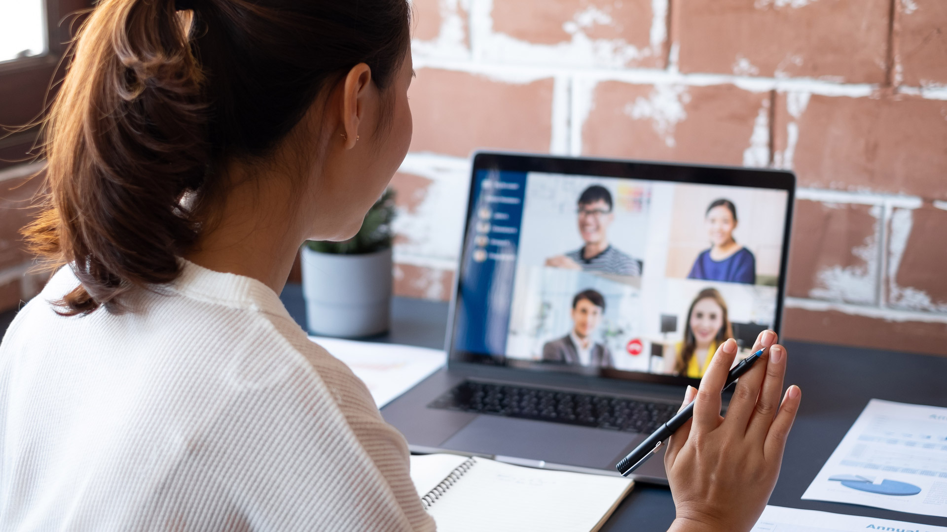 working at home on laptop on team call