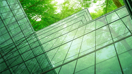Upward view of green corporate building