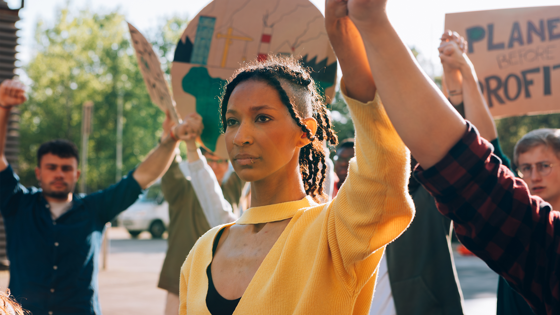 A woman putting up hand in protest
