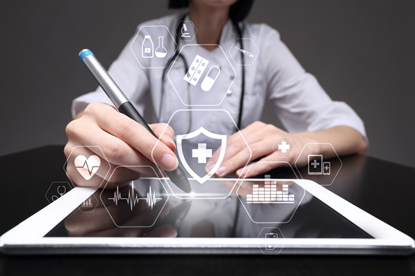 Doctor with tablet