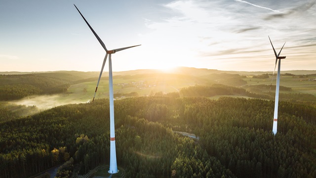 Wind-Turbine-in-the-sunset-seen-from-an-aerial-view